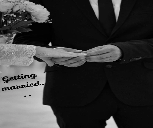 text "getting married" on the background of the couple who are getting married.