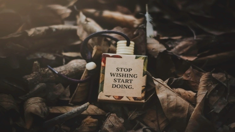 A frame placed below reads, "Stop wishing, start doing."